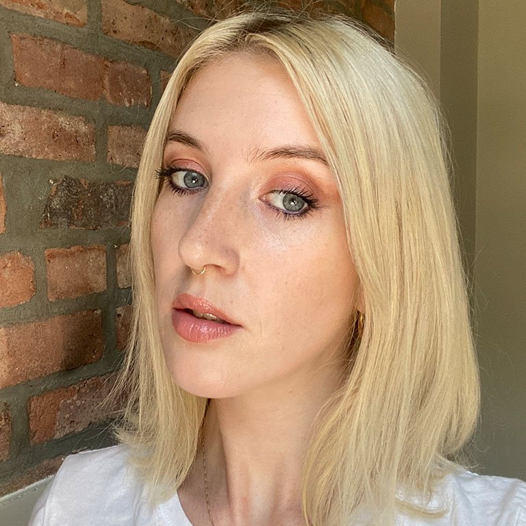 Person wearing Urban Decay Naked Sin Mini Eyeshadow Palette