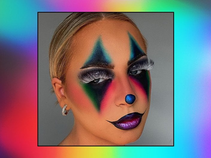 person wearing colorful clown makeup