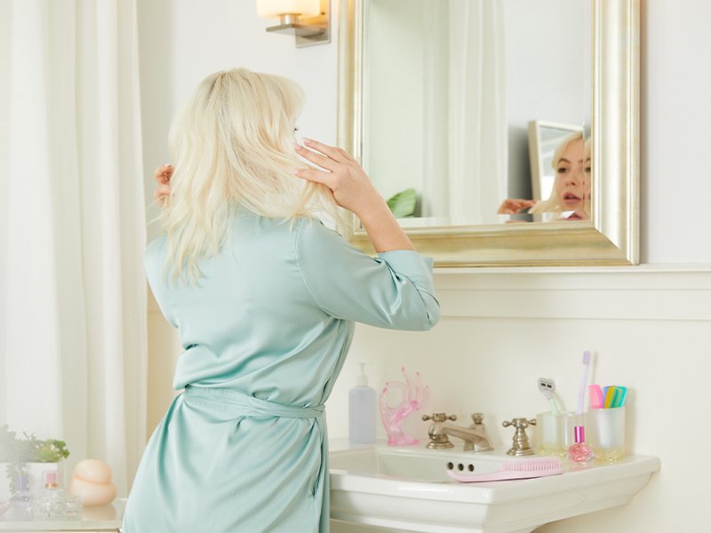 person touching hair