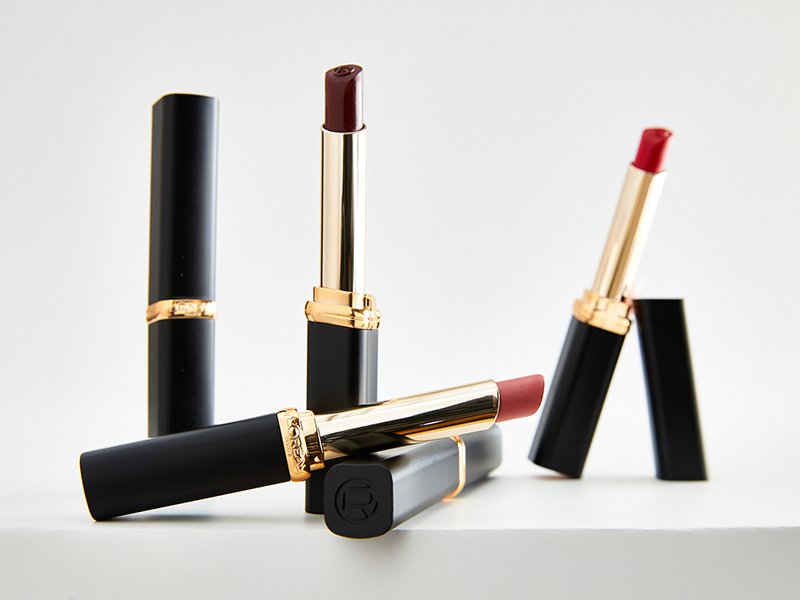 colorful loreal paris lipsticks photographed on a white background
