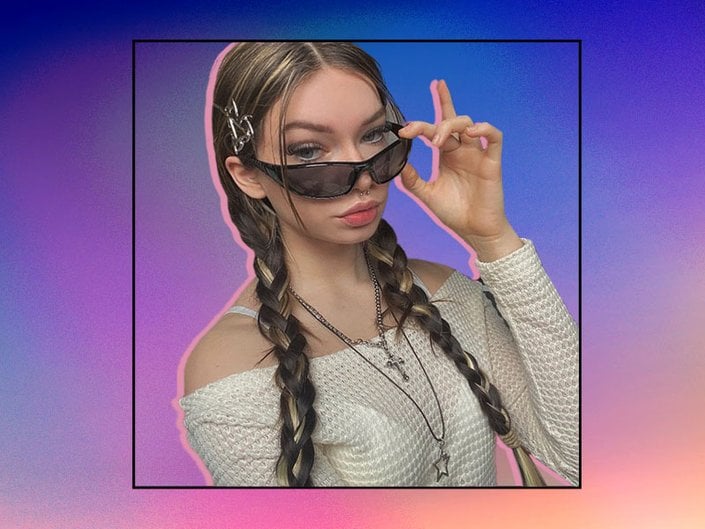 Picture of a person with pigtail braids and sunglasses on a purple and orange gradient background