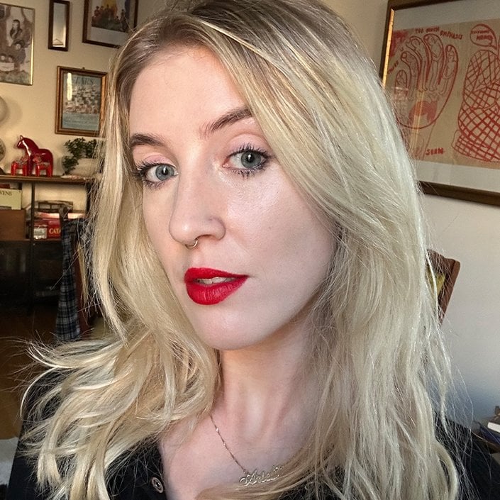 ariel wearing the L’Oréal Paris Colour Riche Intense Volume Matte Lipstick in Le Rouge Determination