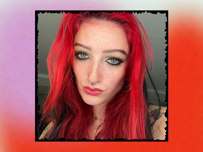 Picture of a person with bright red hair and smoky eyes on a red and purple graphic background