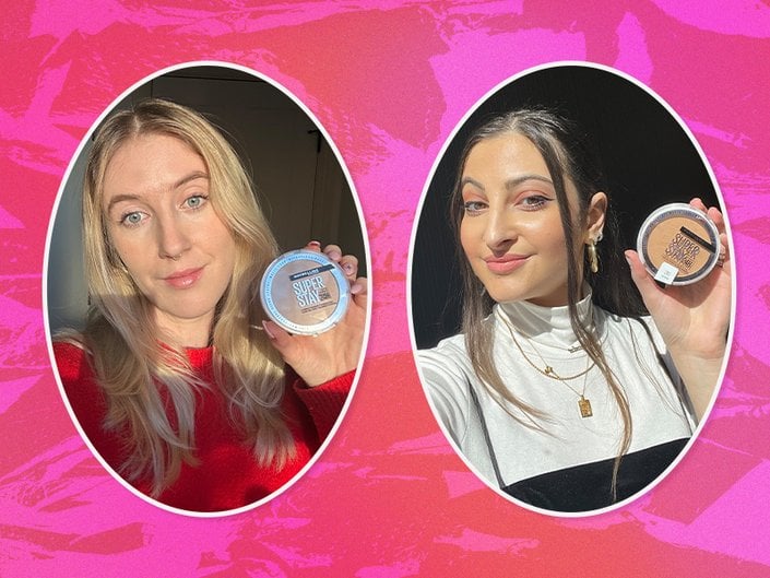 A picture of two people holding the Maybelline New York Superstay Hybrid Powder-Foundation on a hot pink background