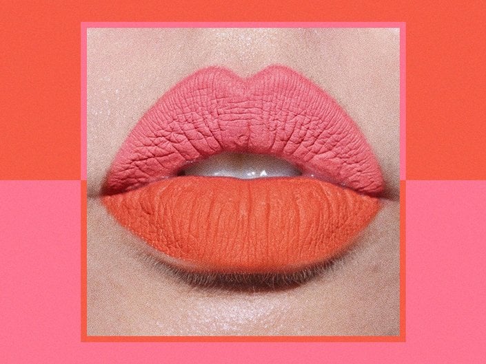 Close-up photo of a two-toned lipstick, with the top lip a coral pink matte shade and the bottom lip a bright orange-red matte shade, collaged on a pink and orange background
