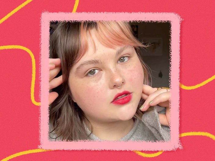 Picture of a person with red lipstick on a graphic red background