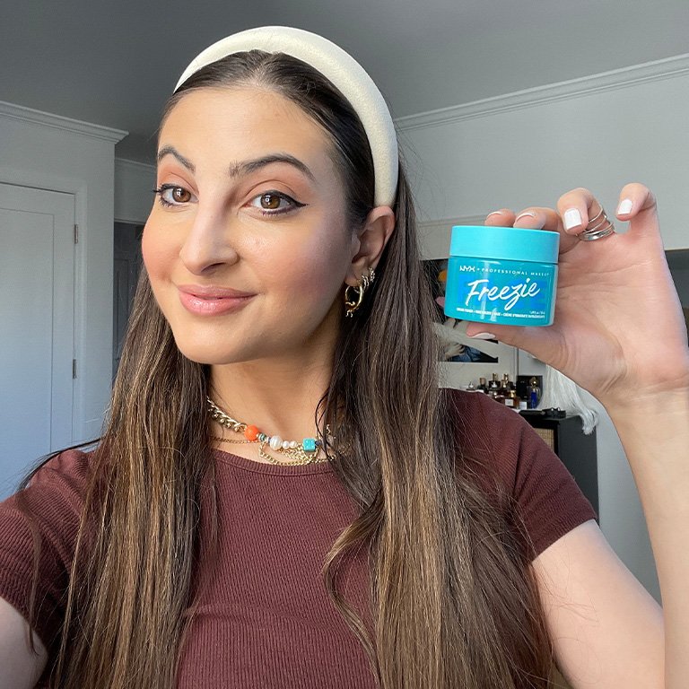 alanna holding the NYX Professional Makeup Face Freezie Cooling Primer + Moisturizer