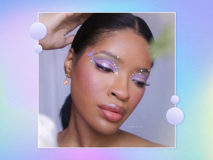 Person wearing a lavender and pearl embellished eyeshadow look.