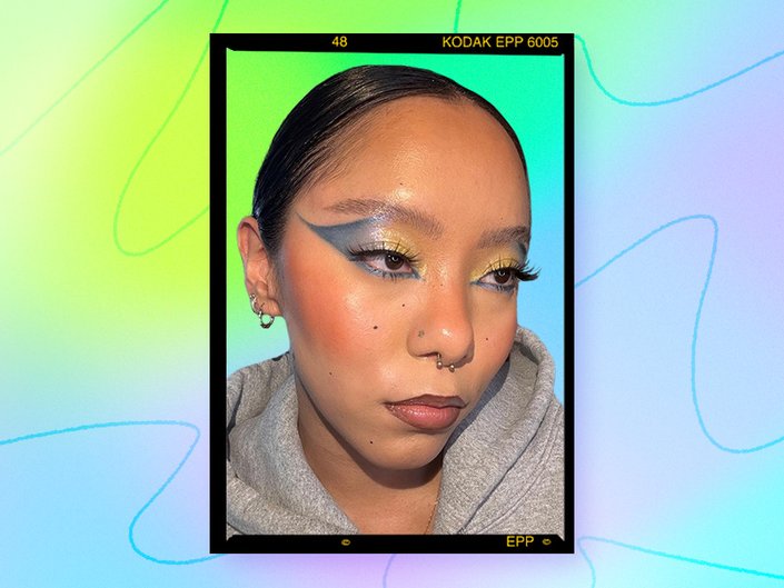 Picture of a person with straight brows looking off-camera on a graphic multicolored background