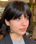 person sporting french bangs