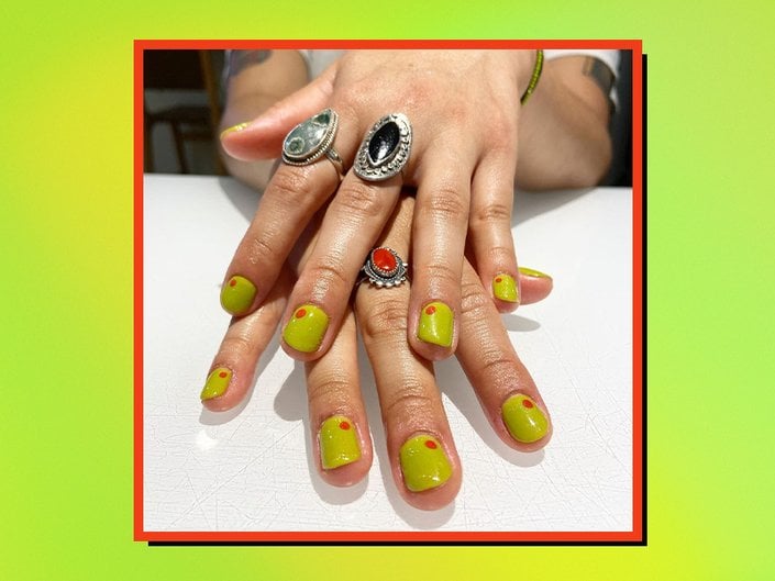 hands with martini nail art