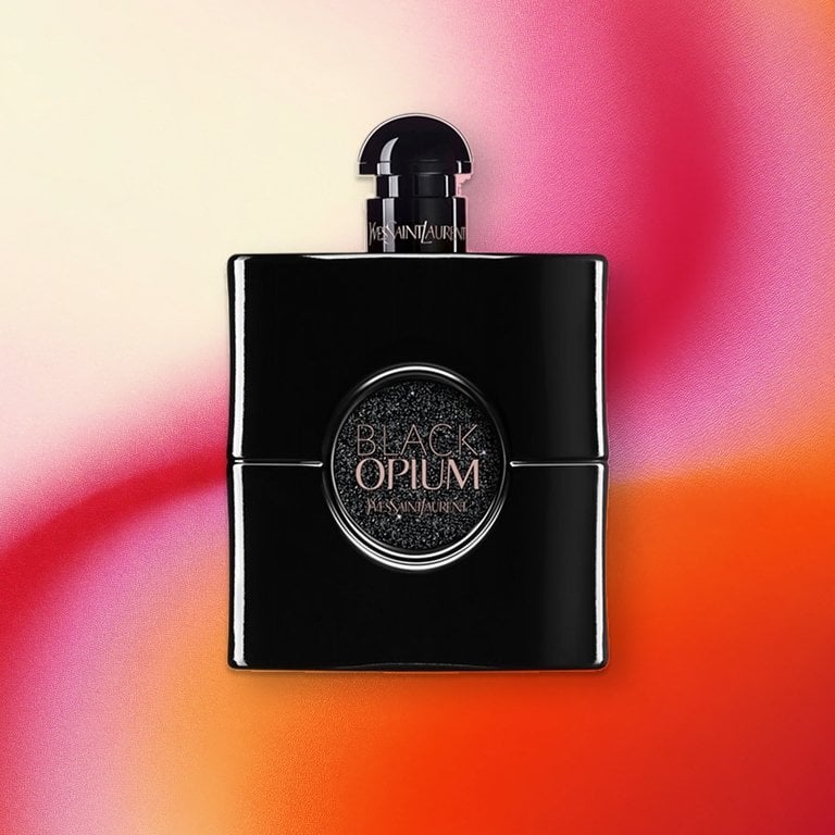 YSL Black Opium Le Parfum on a pink textured background