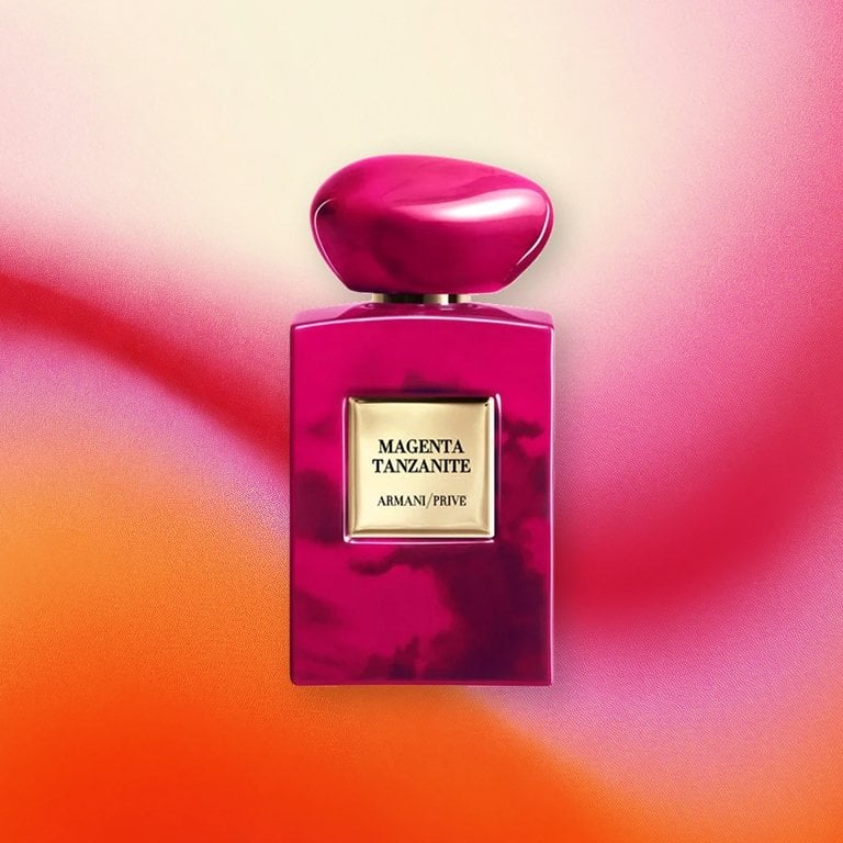 Giorgio Armani Beauty Armani/Prive Magenta Tanzanite Eau de Parfum on a pink textured background