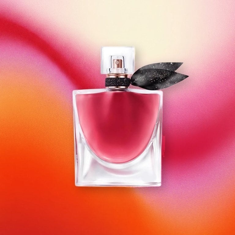 Lancome La Vie est Belle L'Elixir Eau de Parfum on a pink textured background