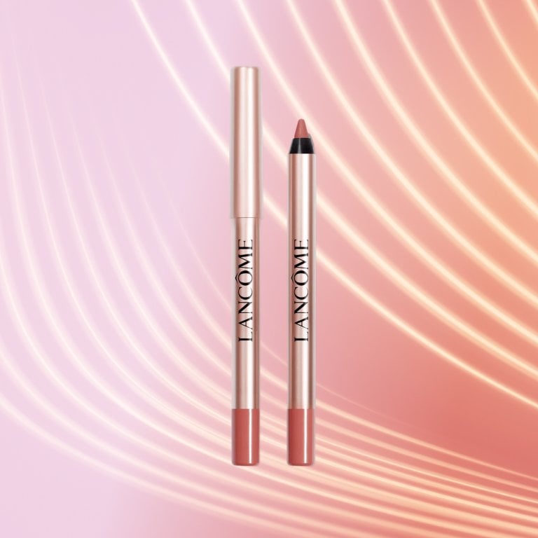 Lancome Lip Idole Lip Shaper on a textured background