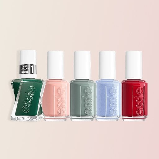 Five bottles of Essie nail polish in the shades Forever Yummy, Bikini So Teeny, Caught in the Rain, In-Vest In Style, and Charm to Stable on a pink background