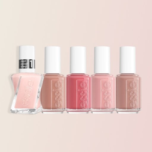 Five bottles of Essie nail polish in the shades Topless & Barefoot, Wild Nude, Eternal Optimist, Lady Like, and Fairy Taylor on a pink background