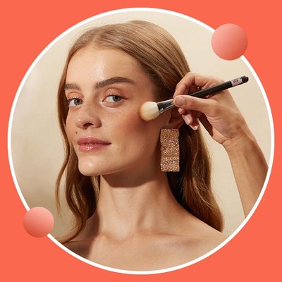 model having blush applied