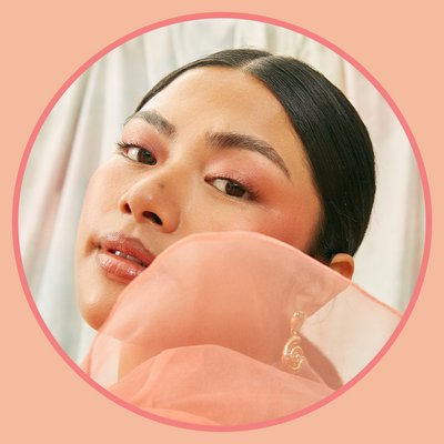 Close up of model with pink makeup on